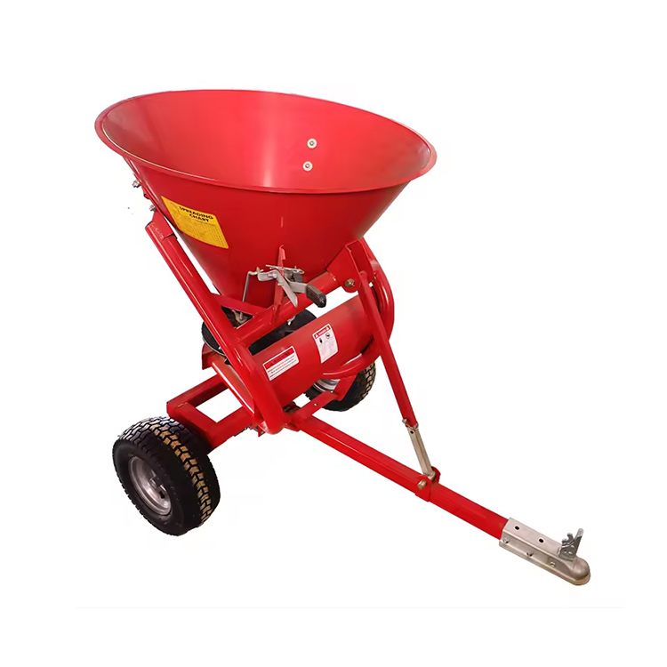 Penyebar traktor